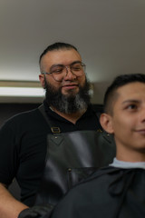 Latin American barber working the style with a long beard in the city of Bogotá.