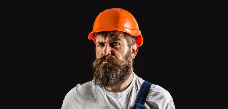 Portrait Builder, Civil Engineer Working. Builder In Hard Hat, Foreman Or Repairman In Helmet. Man Builders, Industry. Bearded Man Worker With Beard In Building Helmet Or Hard Hat