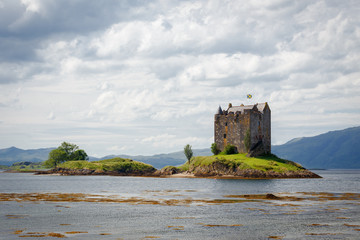 Castle Stalker in Scotland, UK during sunny day