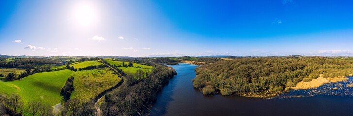 Fototapeta na wymiar panorama aerial view of sunny quoile river winter countryside in Downpatrick,Northern Ireland