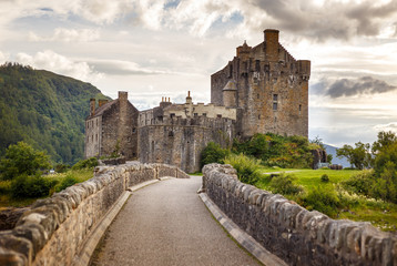 Fototapeta na wymiar Eilean Donan Castle from 13th century in the centre of three lochs - Alsh, Duich, Long, in Dornie, Kyle of Lochalsh, Scotland, UK