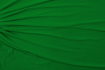 St. Patrick's Day Inspired Flowing Green Fabric Background