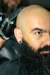 Latin American barber working the style with a long beard in the city of Bogotá.