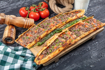 Traditional Turkish Cuisine; pide with cubed meat / kusbasili pide.Turkish pita concept.