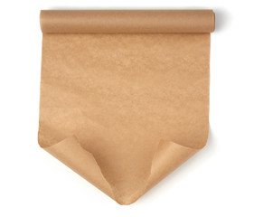 curled roll of brown parchment paper with curled edges isolated on a white background
