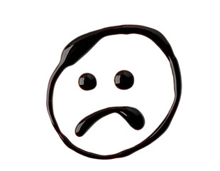 Sad smile painted with chocolate syrup, isolated on white background