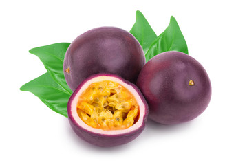 Obraz premium Two whole passion fruits with leaves and a half isolated on white background. Isolated maracuya