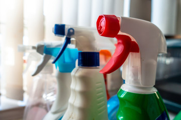 Spray bottles of cleaning products for disinfecting and making clean.