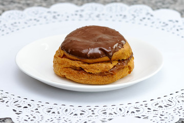 Cake brewed with cream of condensed milk with sugar and chocolate glaze. Russian Sweeten cake