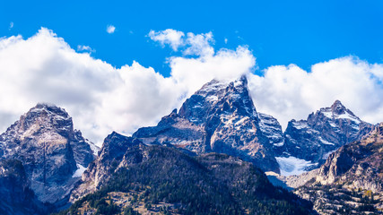 The tall mountain peaks of Middle Teton (12,804 Ft), Grand Teton (13,770 Ft) and Mount Owen (12,928 Ft) in the Teton Range of Grand Teton National Park in Wyoming, United States