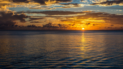Fototapeta na wymiar Sunset on the Caribbean Sea near the port of St. George's, Grenada