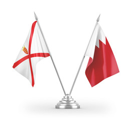 Bahrain and Jersey table flags isolated on white 3D rendering