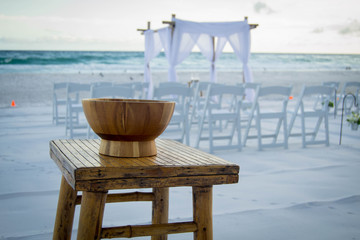 Wooden bowl decor for beach wedding
