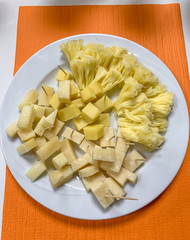HUNENBERG, SWITZERLAND - FEBRUARY 14, 2020: Plate with sliced ​​Swiss cheese for starters.