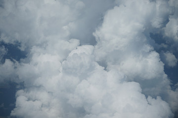 Naklejka na ściany i meble Cloud closeup view from airplane.
