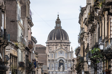 View from Giuseppe Garibaldi Street on St Agatha Cathedral, main religious landmark of Catania city on Sicily, autonomous region of Italy