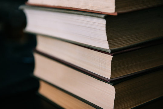 Close-up of a stack of hardback books