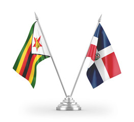 Dominican Republic and Zimbabwe table flags isolated on white 3D rendering