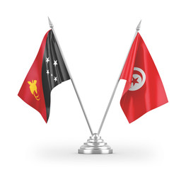Tunisia and Papua New Guinea table flags isolated on white 3D rendering