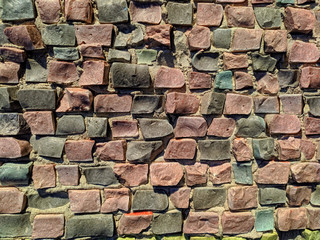 Texture of the stone mosaic motley color, close-up.