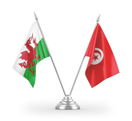 Tunisia and Wales table flags isolated on white 3D rendering