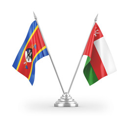 Oman and Eswatini Swaziland table flags isolated on white 3D rendering