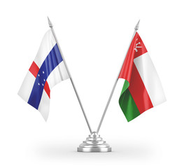 Oman and Netherlands Antilles table flags isolated on white 3D rendering