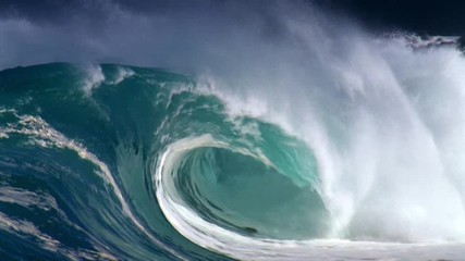 Large heavy wave breaking onto a shallow reef. Power of the nature