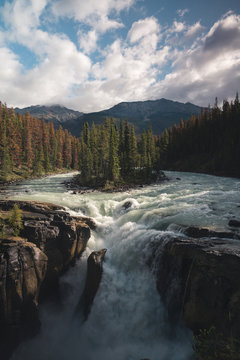 Beautiful Sunwapta Waterfall In Jasper National Park In The Canadian Rockies With Converging Rivers