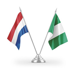 Nigeria and Netherlands table flags isolated on white 3D rendering