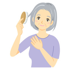 髪をとかす女性（グレイヘア・白髪）