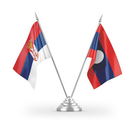 Laos and Serbia table flags isolated on white 3D rendering