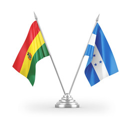 Honduras and Bolivia table flags isolated on white 3D rendering