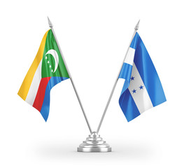 Honduras and Comoros table flags isolated on white 3D rendering