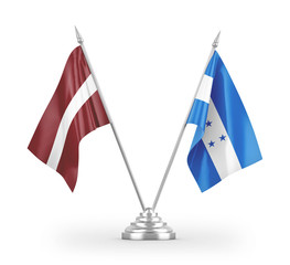 Honduras and Latvia table flags isolated on white 3D rendering