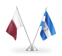 Honduras and Qatar table flags isolated on white 3D rendering