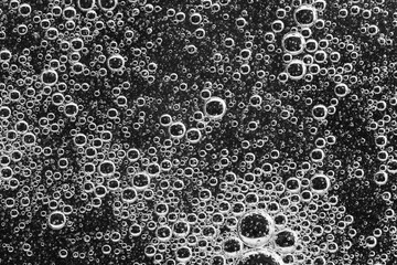 Underwater air bubbles in the black-and-white.