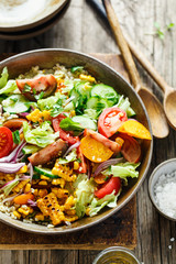 Vegetable salad with grilled corn.