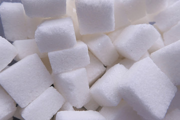 Close up of sugar cube on table, diabetic concept 