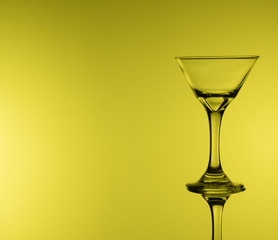 creative wine glass photography with yellow background