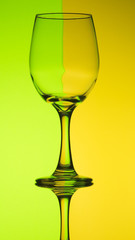 creative wine glass photography with yellow background