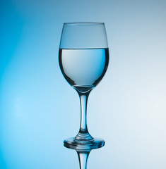 creative wine glass photography with blue background