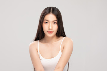 Beautiful Asian woman looking at camera smile with clean and fresh skin Happiness and cheerful with positive emotional,isolated on white background,Beauty and Cosmetics Concept