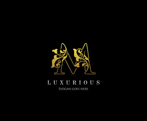 Gold M letter luxury beauty flourishes ornament monogram logo perfect for boutique, wedding invitation, restaurant,hotel.