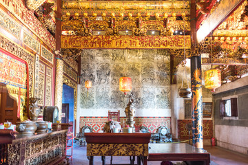 The altar inside the Khoo Kongsi, a large Chinese clanhouse with elaborate and highly ornamented...