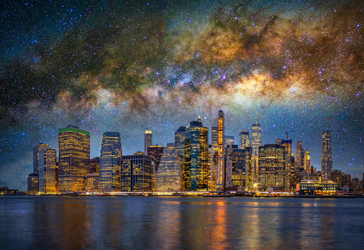 Panorama scene of New York Cityscape beside the east river at the night time over the milky way on the dark sky background, USA downtown skyline, Architecture and building, Surreal picture concept