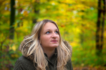Fototapeta premium A girl in autumn forest