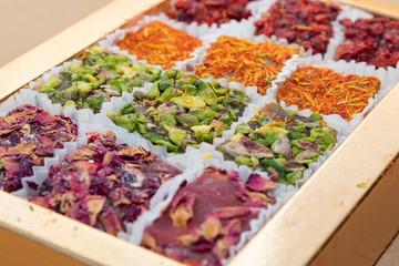 Open box assorted lokum four flavors, traditional oriental sweet