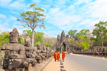 Three buddhist monks in Prasat Bayon Temple, Angkor, Siem Reap, Cambodia