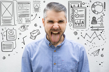Hand drawn UI or UX pictures with bearded man showing tongue. Front view of careless young guy...